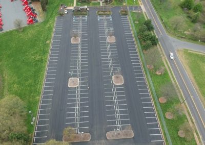 Aerial view of a newly striped commercial parking lot