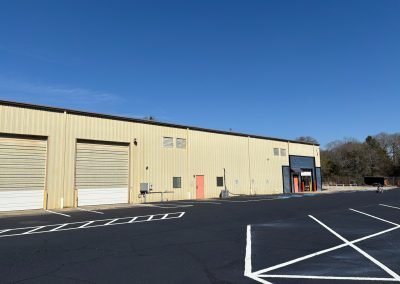 Line-striped parking lot at a commercial warehouse